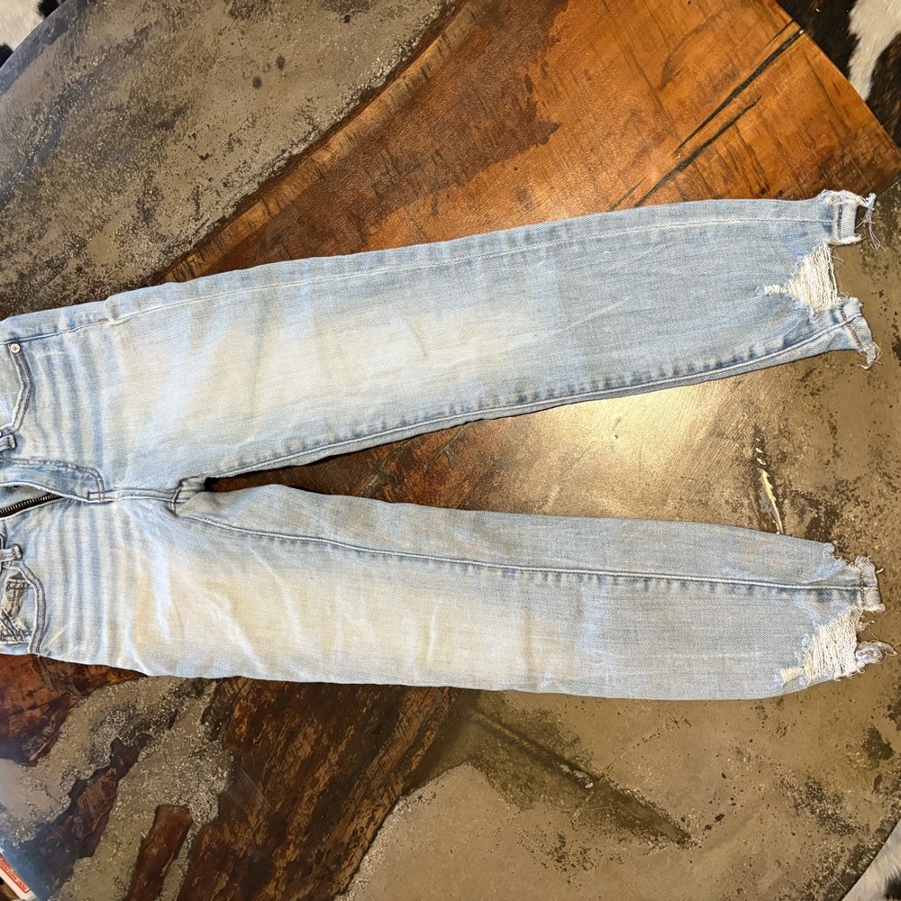 Buckle Blue Skinny Jeans with Distressed Vintage Look